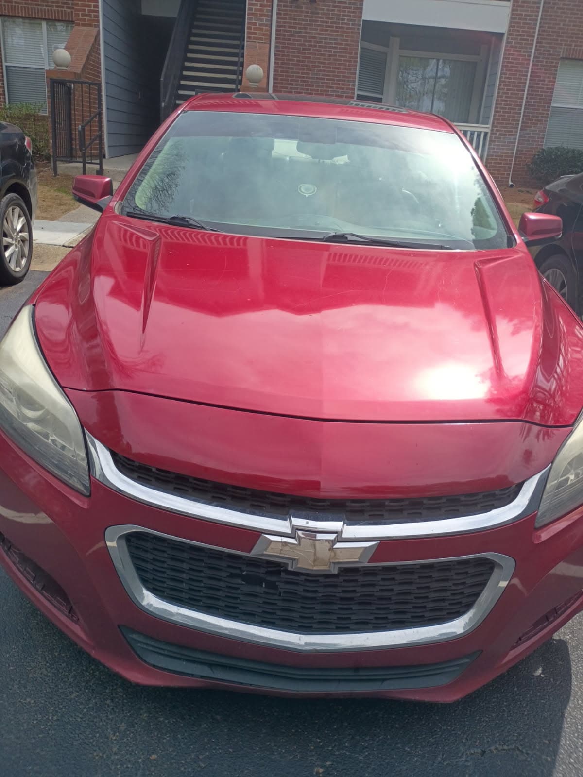 Red Chevrolet Malibu purchased for cash in Atlanta GA — we buy any make any condition