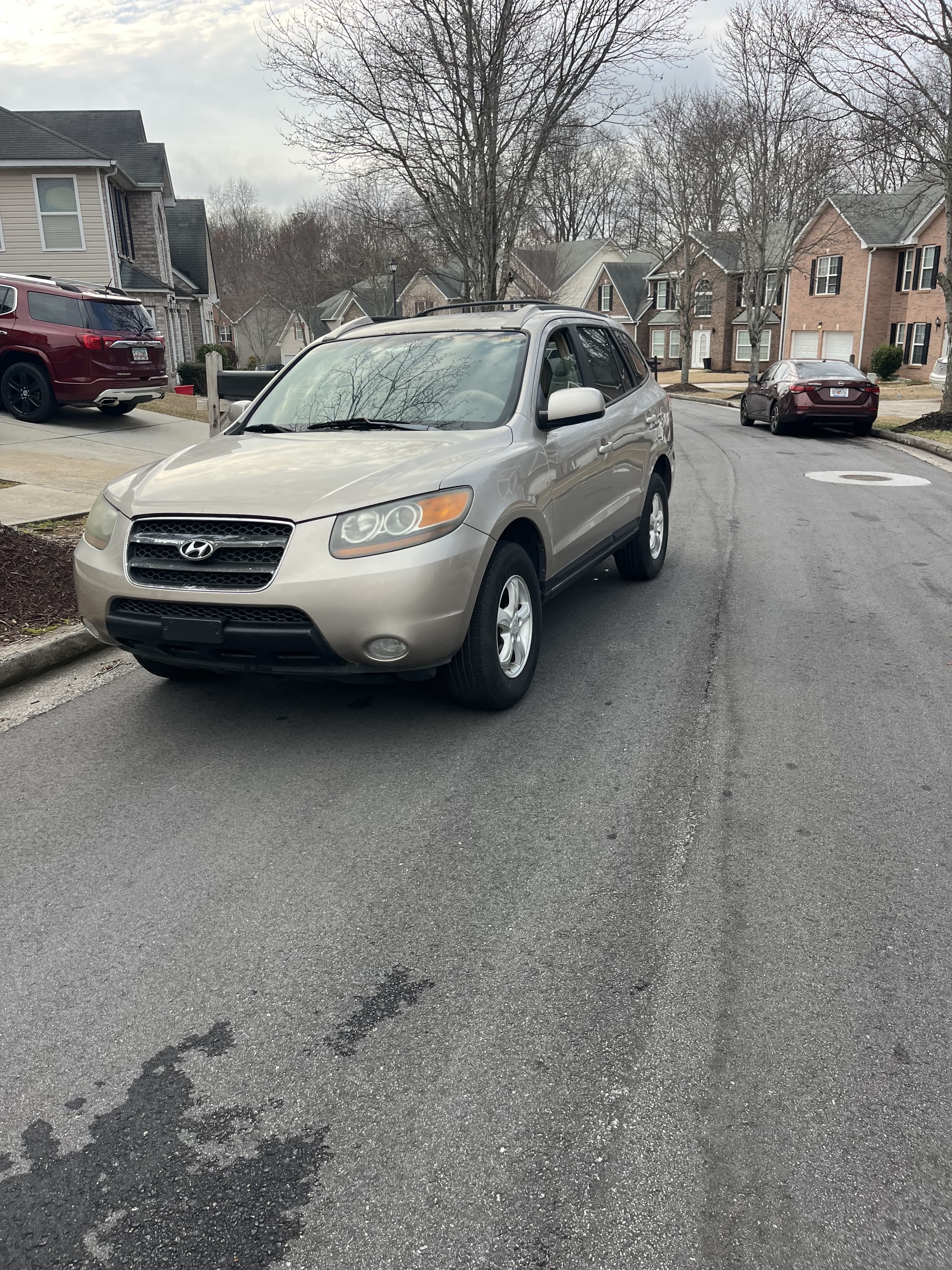 Hyundai Santa Fe SUV purchased for cash in Atlanta Georgia neighborhood — junk car buyer